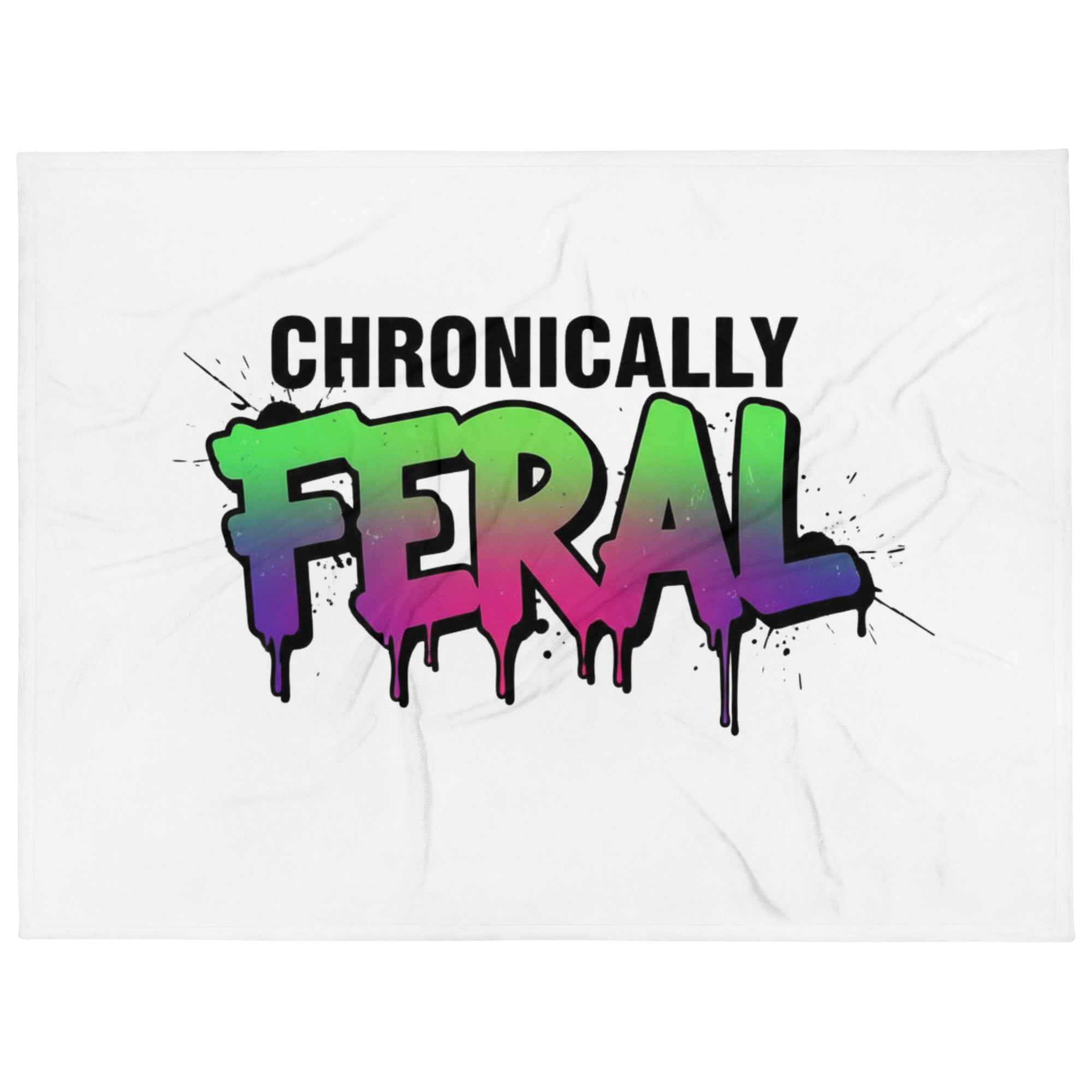 White throw blanket with "CHRONICALLY" in black block letters and "FERAL" in large bold graffiti lettering with a green-to-purple rainbow gradient, heavy paint drips, and ink splatter. Feral as Fhawk™.